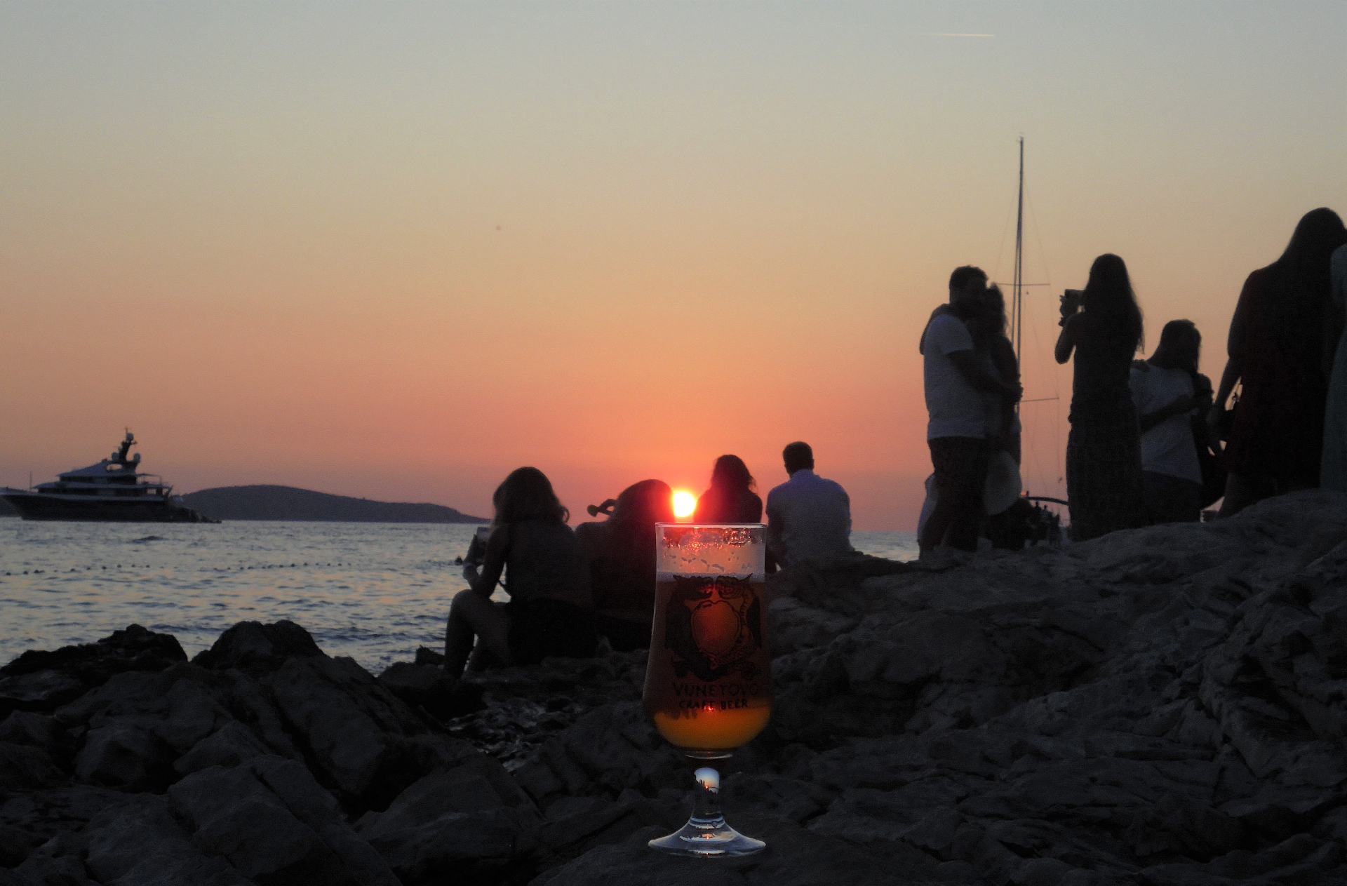 Golden hour sunset beer on the Hvar waterfront